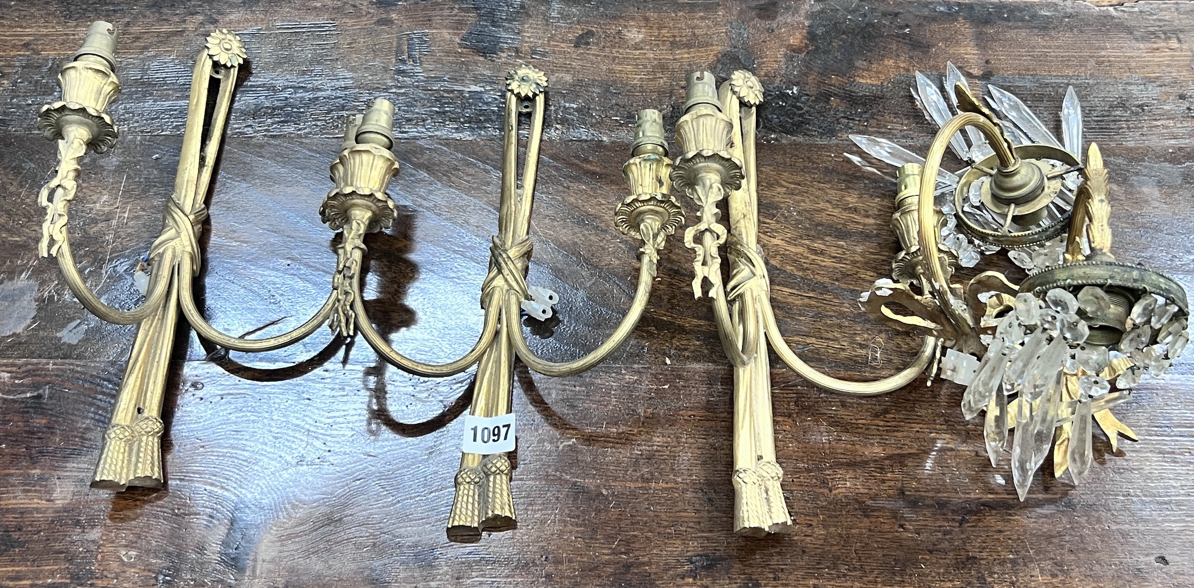 Five (three plus two) assorted gilt metal wall lights